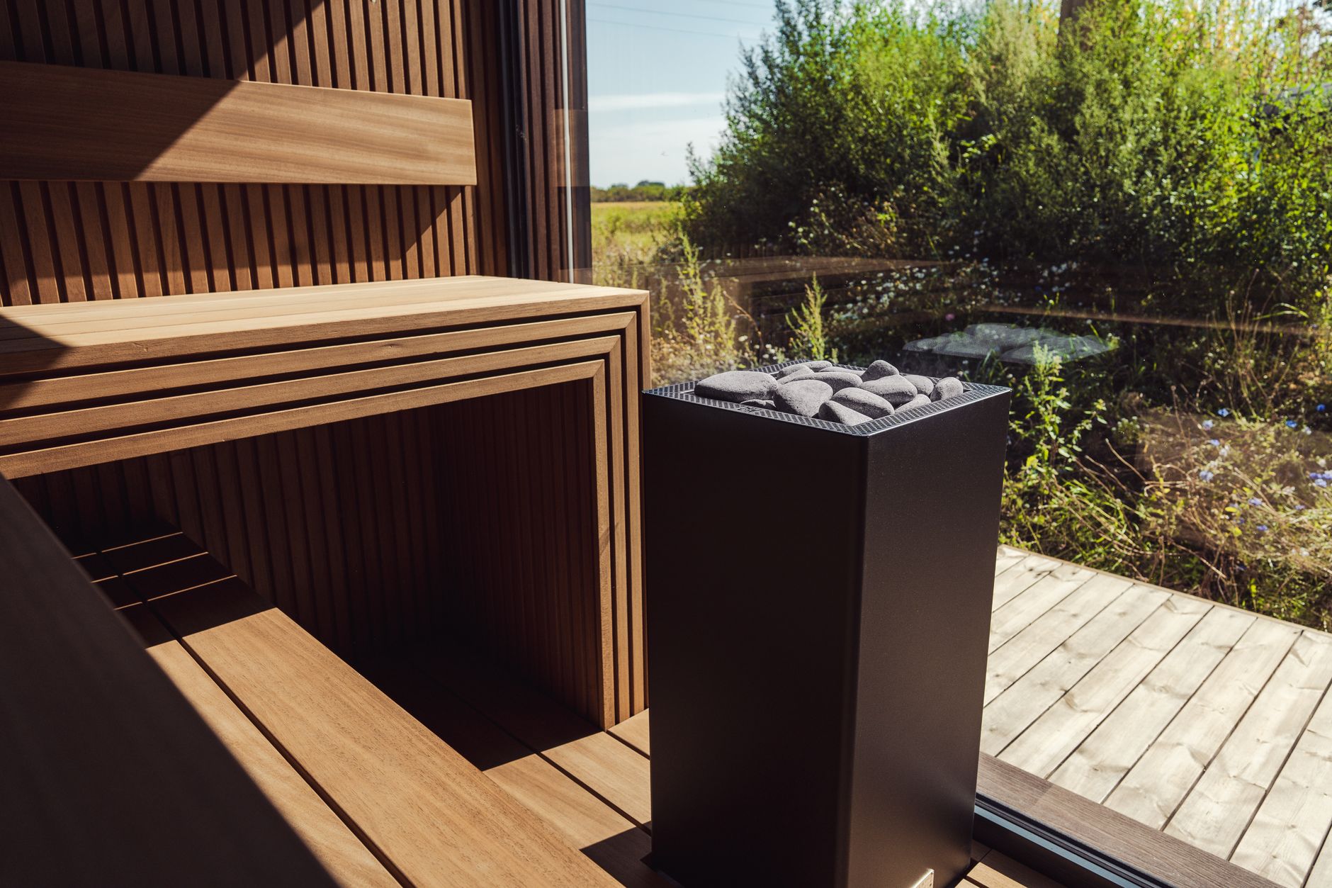 modern outdoor sauna with electric heater
